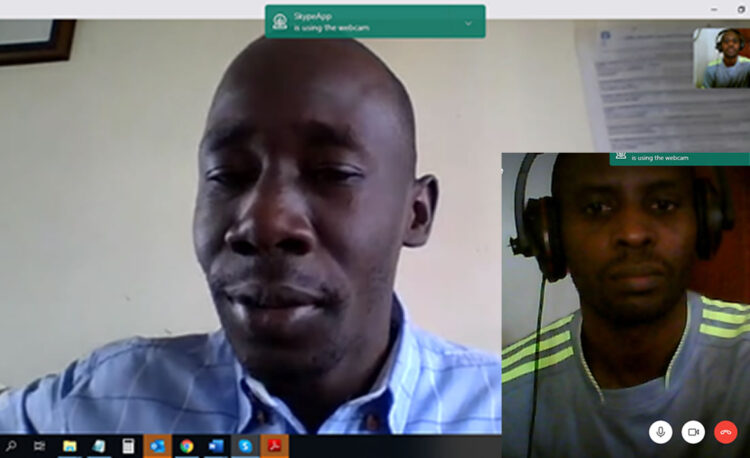 A collaborative skype meeting with Mr Ambrose Ogwang (Left), LWF Area Coordinator, Rwamwanja Refugee Settlement